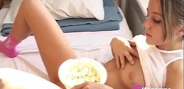  Cute Young Andi Pink Eats Popcorn Showing Her Bare Pussy!
